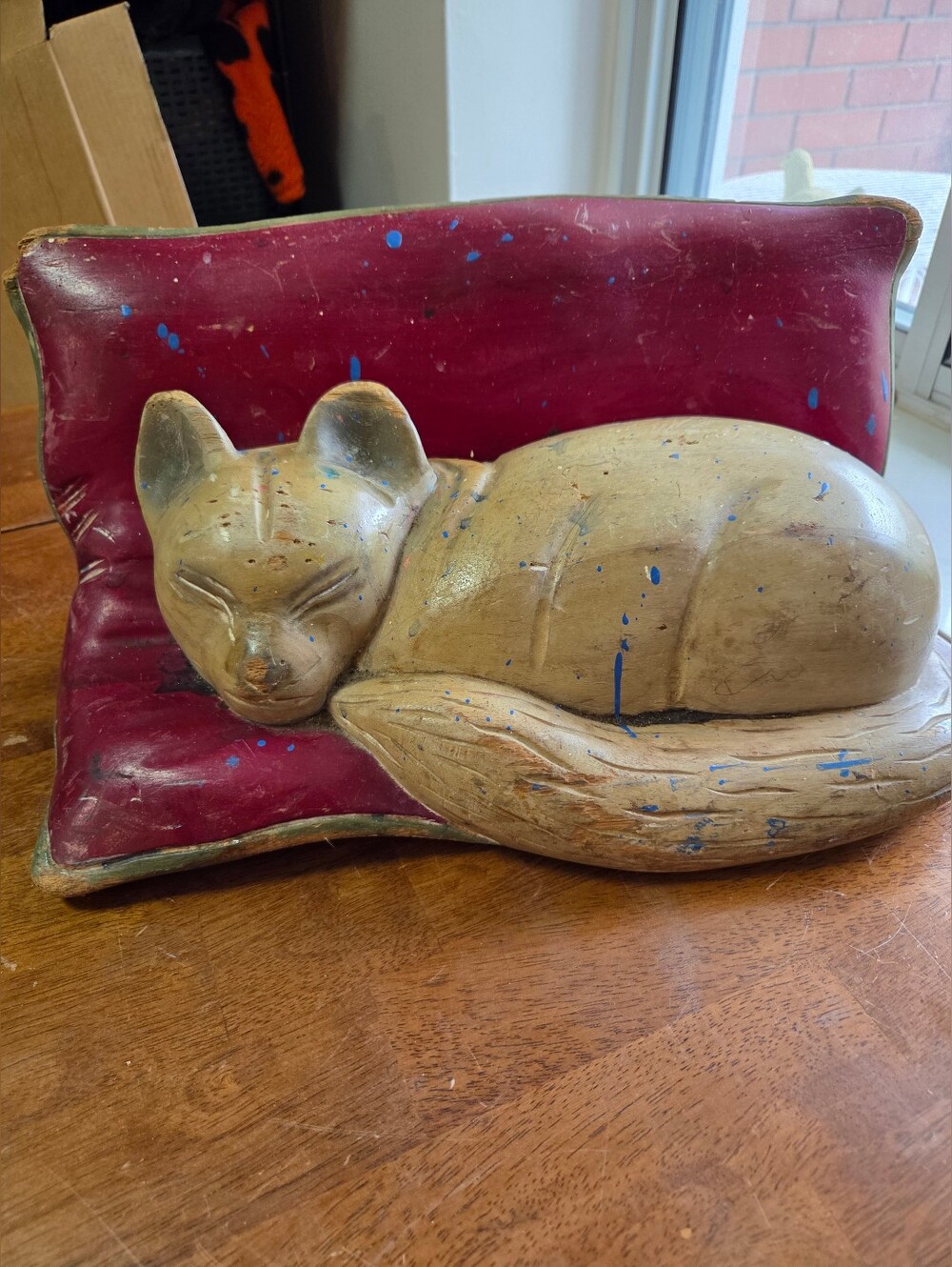 Vintage Hand-Carved Wooden Sleeping Cat Sculpture on Red Pillow – Folk Art Figur